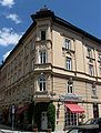 This neo-renaissance corner building, built in 1892, was originally the location of the sculpture of Heine, which was replaced by a year with and upside down "5".[13]