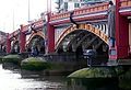 Image 40Vauxhall Bridge across the River Thames opened in 1906 and features sculptures by F. W. Pomeroy.