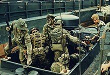 Navy SEAL team boards a Light SEAL Support Craft