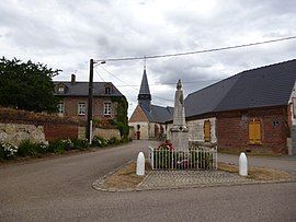 Th war memorial and church in Campremy