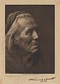 Signed photogravure by Edward S. Curtis of a Navaho medicine-man.