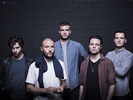 The Maccabees in 2015 (From left to right: Felix White, Orlando Weeks, Rupert Jarvis, Hugo White, and Sam Doyle.)