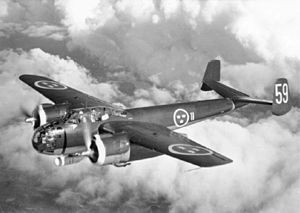 A Swedish Air Force S 18A flies with the F 11 Wing over Sweden, c. 1946