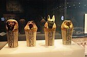 Complete set of canopic jars decorated with hieroglyphics; 744–656 BC; painted sycomore fig wood; various heights; British Museum (London)