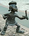 Image 43Statue of Minnie the Minx, a character from The Beano, in Dundee, Scotland. Launched in 1938, The Beano is known for its anarchic humour, with Dennis the Menace appearing on the cover. (from Culture of the United Kingdom)