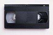 Visual of the top view of a VHS cassette.