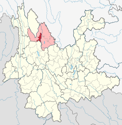 Location of Gucheng District (red) and Lijiang City (pink) in Yunnan