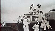 Staff stand in front of a Fino truck