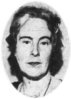 A black and white photograph of a woman's head