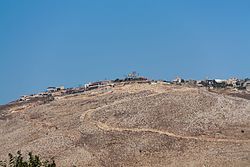 The village of Maroun al-Ras, as seen from the Israeli side of the border, near Avivim