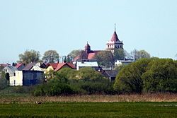 Łapy's skyline featuring St. Peter and Paul's church