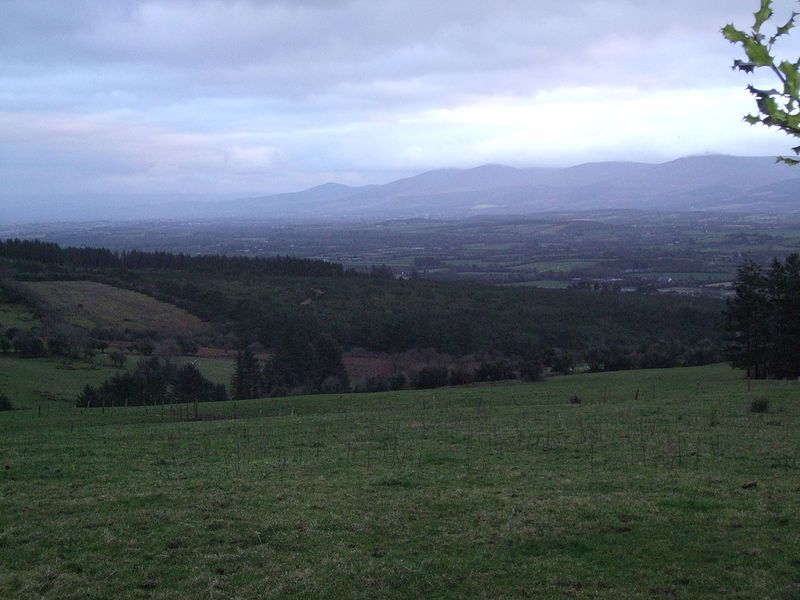 File:Knockmealdowns in distance.JPG