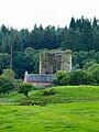 Penninghame Home Farm. View across fields to the south of the farm towards the remains of Castle Stewart