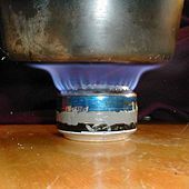 A beverage-can stove; the pot stand is omitted for clarity