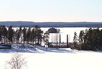 Oljeön is in the foreground. The picture is taken from Ängelsberg.