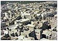 The attached images depict the neighborhoods and houses of Qatif Castle prior to their removal. Notably, some roofs remain unroofed, a local practice known as A'arsh.