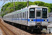 10050 series 6-car set 11654 in new colour scheme and Urban Park Line branding in May 2022