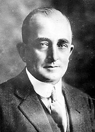 A black-and-white headshot photograph of Arturo Araujo in early-20th century formal attire facing the camera