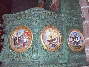 Scenes from the life of St Ronan of Locronan on the polychrome pulpit at the Locronan parish church.