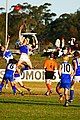 Two ruckmen contest the bounce in a suburban western Sydney AFL game between the East Coast Eagles AFC and Campbelltown Kangaroos AFC