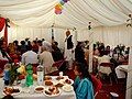 Families and friends are usually seated in a large hall during the ceremony