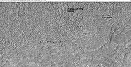 Close-up of lobate debris apron from the previous CTX image of a mesa. Image shows open-cell brain terrain and closed-cell brain terrain, which is more common. Open-cell brain terrain is thought to hold a core of ice. Image is from HiRISE under HiWish program.