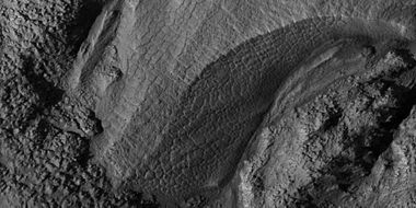 Close-up of gully alcove showing "gullygons" (polygonal patterned ground near gullies), as seen by HiRISE under HiWish program Note this is an enlargement of a previous image.