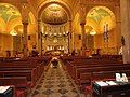 The church interior. Notice the sanctuary dome which is a copy of that of St. Clemente Bascilica Rome.