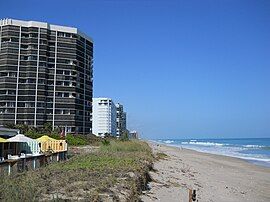 Looking north along the beach from Shuckers Restaurant, 9800 South Ocean Drive