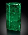 Large, di-hexagonal prismatic crystal of 1,390 carats uncut with a deep green color. It is transparent and features few inclusions in the upper 2/3, and is translucent in the lower part.