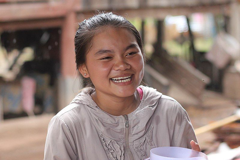 File:Teenage girl laughing.jpg