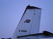 Logo on tail of Arctic Sunwest Charters Twin Otter, C-GARW