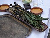 Roasted calçots with sauce for dipping