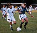 Image 21Mia Hamm (left) battles with German defender Kerstin Stegemann (from Women's association football)