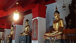 Seated Buddhas in the base of the stupa