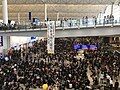 Liberate Hong Kong banner inside Hong Kong airport, 2019