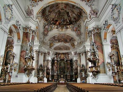 A highly theatrical white Rococo interior from the 18th century, at the Basilica at Ottobeuren, in Bavaria.