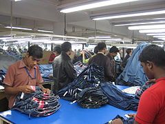 The final steps of preparing jeans for market