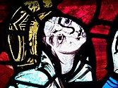 Stained glass window at Poitiers Cathedral allegedly portraying Eleanor in a crucifixion scene