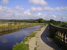 View from the towpath showing the ornate stone balustrades