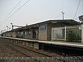 Eastbound view of former ground level Platform 2 and station building, December 2006