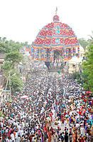 chariot festival with people drawing a chariot with ropes