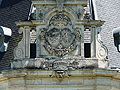 The armorial pediment on the logis