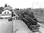 Canadian National Railway locomotive #1047 with a freight train at the Langley, British Columbia railway station in 1924