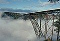 Bridge as seen from the National Park Service Visitors Center, with fog in the New River Gorge below