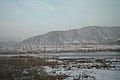 View across the river from Tumen city in China to the town of Namyang in North Korea