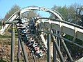 A Bolliger & Mabillard Inverted Roller Coaster train seats riders 4 across.