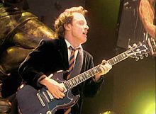 Angus Young is the lead guitarist for the rock band AC/DC