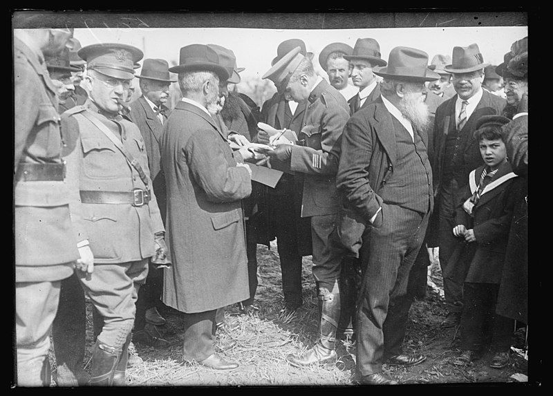 File:Signing-the-contract-by-which-the-american-red-cross-agrees-to-build-the-village-6ea4ef.jpg