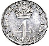 Silver coin with a design featuring a crowned number 4